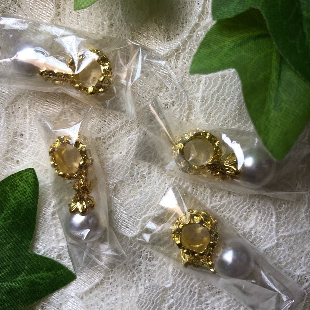 Four Vintage Gold-Tone Pearl-dangle Charms with Flower Bails. New in Package.